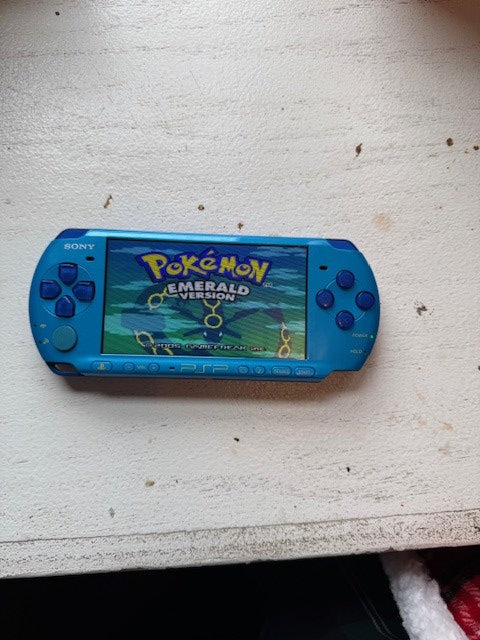 Blue Sony PSP 3000 (Modded) – 64GB – N64 & GBA Games Loaded